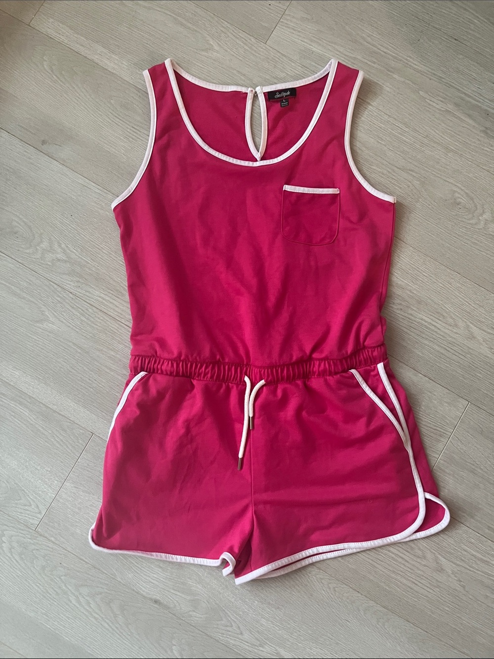 Pink Sleeveless Romper with White Trim